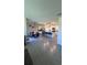 Spacious living area integrating dining and kitchen spaces for easy socializing at 4147 Sherlock Ct, Orlando, FL 32824