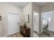 Welcoming entryway with tile flooring, leading to bathroom and bedroom at 4907 Romeo Cir, Kissimmee, FL 34746