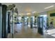 Community gym with treadmills, weights, weight machines, and televisions at 4907 Romeo Cir, Kissimmee, FL 34746