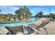 Relaxing lazy river surrounded by lush landscaping and palm trees, perfect for a leisurely float at 4907 Romeo Cir, Kissimmee, FL 34746