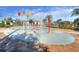 Fun-filled splash pad in the community, featuring colorful water features and plenty of space to play at 4907 Romeo Cir, Kissimmee, FL 34746