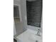 Bathroom featuring tiled wall and a modern sink at 5017 Steyr St, Orlando, FL 32819