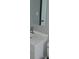 Bright bathroom featuring a modern sink, mirror, and toilet at 5017 Steyr St, Orlando, FL 32819