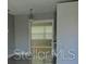 Neutral bedroom with closet and bright window at 5017 Steyr St, Orlando, FL 32819