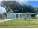 Exterior view of home with fenced yard at 5017 Steyr St, Orlando, FL 32819