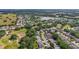 Stunning aerial shot of a neighborhood with a golf course and natural ponds at 5137 Links Ln, Leesburg, FL 34748