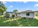 Well maintained backyard and exterior view of the home at 5137 Links Ln, Leesburg, FL 34748