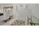Bright and inviting foyer with tile flooring, a decorative rug and stylish accents at 5137 Links Ln, Leesburg, FL 34748