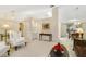 Comfortable living area offering a glimpse into the dining room at 5137 Links Ln, Leesburg, FL 34748