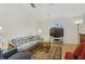 Bright living room with neutral colors and a large window with a view at 5137 Links Ln, Leesburg, FL 34748
