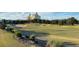 Scenic golf course with green grass and trees at 7683 Heritage Crossing Way # 202, Reunion, FL 34747