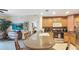 Beautiful kitchen with a large island featuring a breakfast bar and modern appliances, perfect for Gathering gatherings at 7683 Heritage Crossing Way # 202, Reunion, FL 34747