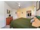 Bedroom featuring a closet, carpet flooring, a dresser, and a bedside table at 8923 Legacy Ct # 19-102, Kissimmee, FL 34747