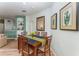 Comfortable dining area featuring a wooden table, six chairs, and modern decor at 8923 Legacy Ct # 19-102, Kissimmee, FL 34747
