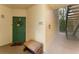 The entrance has a green door, a bench, and the unit number at 8923 Legacy Ct # 19-102, Kissimmee, FL 34747