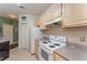 Functional kitchen featuring white appliances, ample counter space, and neutral finishes at 8923 Legacy Ct # 19-102, Kissimmee, FL 34747