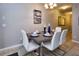 Cozy dining area featuring a modern table setting, perfect for intimate meals at 8971 Candy Palm Rd, Kissimmee, FL 34747