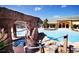 An amazing pool with a beautiful rock waterfall feature at 8971 Candy Palm Rd, Kissimmee, FL 34747