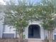 Building entrance with stairs leading to a second-level apartment at 4745 S Texas Ave # A, Orlando, FL 32839