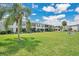Well-maintained building exteriors with lush landscaping and manicured lawns at 1038 Plantation Dr # D9, Kissimmee, FL 34741