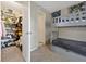 Cozy bedroom features a gray bunk bed and a closet stocked with shoes and other items at 1051 S Hiawassee Rd # 2127, Orlando, FL 32835