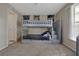 The bedroom includes a grey bunk bed, neutral carpet, and art at 1051 S Hiawassee Rd # 2127, Orlando, FL 32835