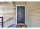Close-up of the exterior front door of the home at 1051 S Hiawassee Rd # 2127, Orlando, FL 32835