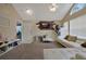 Cozy living room with a modern sofa and decorative wall accents at 1051 S Hiawassee Rd # 2127, Orlando, FL 32835