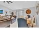 Inviting living room featuring a dining area, comfortable seating, and modern décor at 1083 Snively Cir, Lake Hamilton, FL 33851