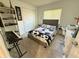 Inviting bedroom with a soccer theme, a comfortable bed, and ample storage space for a or teen at 12273 Pescara Ln, Orlando, FL 32827