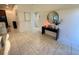 Stylish foyer with modern decor and tile flooring leading to other areas of the home at 12273 Pescara Ln, Orlando, FL 32827
