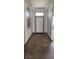 Inviting foyer showcasing tile flooring, a decorative window, and neutral paint tones, creating a welcoming entrance at 130 Highland Meadows St, Davenport, FL 33837