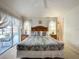 Comfortable main bedroom features a sliding glass door leading to a private outdoor pool at 1301 Rebecca Dr, Haines City, FL 33844