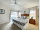 Spacious main bedroom offers bright lighting and a sliding glass door leading to the pool at 1301 Rebecca Dr, Haines City, FL 33844