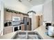 Modern kitchen with stainless steel appliances and ample counter space at 1301 Rebecca Dr, Haines City, FL 33844
