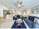 Cozy living room with a clear view of the kitchen and dining spaces at 1301 Rebecca Dr, Haines City, FL 33844