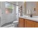 Modern bathroom featuring glass shower, updated vanity and sleek fixtures at 133 Torino Ln, Kissimmee, FL 34759