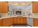 Open kitchen featuring a eat-in bar at 133 Torino Ln, Kissimmee, FL 34759