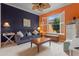 Comfortable living room with a sofa and natural lighting at 133 Torino Ln, Kissimmee, FL 34759