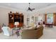 Bright and spacious living room with open layout, neutral colors, and tile flooring at 133 Torino Ln, Kissimmee, FL 34759