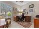 Office with wood desk and tile flooring at 133 Torino Ln, Kissimmee, FL 34759