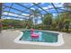 Inviting screened-in pool with clear blue water, perfect for a refreshing swim in your own private oasis at 133 Torino Ln, Kissimmee, FL 34759