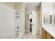 Bathroom with tile flooring, tub, shower and open doorway to toilet at 1411 Celebration Ave # 106, Celebration, FL 34747