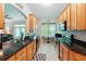 Open kitchen boasts granite countertops, stainless steel appliances and a casual dining area at 1411 Celebration Ave # 106, Celebration, FL 34747