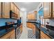 Beautiful kitchen featuring granite countertops, modern appliances, and ample cabinet space at 1411 Celebration Ave # 106, Celebration, FL 34747
