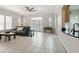 Bright living room with tile flooring, ceiling fan and plenty of windows at 1411 Celebration Ave # 106, Celebration, FL 34747