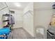 Spacious walk-in closet with plenty of shelving and storage for clothes and accessories at 1411 Celebration Ave # 106, Celebration, FL 34747