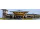 Grand clubhouse entrance with stone accents and covered walkway at 145 Willow Dr, Poinciana, FL 34759