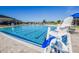 Beautiful community pool with ample seating and lifeguard station at 145 Willow Dr, Poinciana, FL 34759