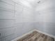 Empty walk-in closet with wire shelving, providing ample storage space and organization at 145 Willow Dr, Poinciana, FL 34759
